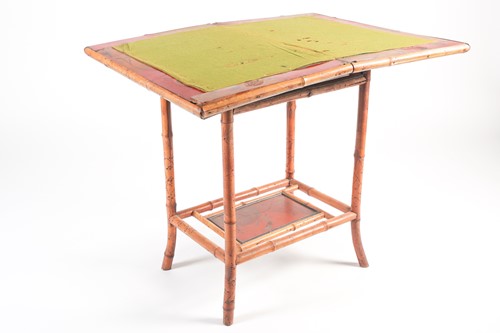 Lot 87 - A 19th century bamboo and painted lacquer fold-...