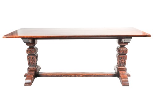 Lot 88 - A 17th century style oak refectory table by G,...