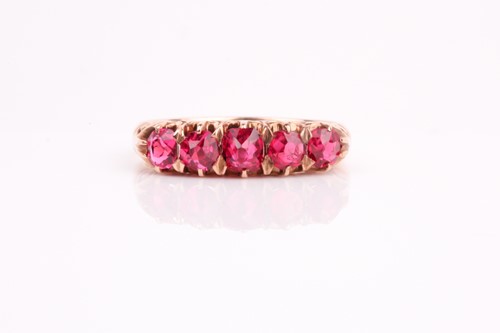 Lot 187 - A five stone half hoop spinel ring, the...