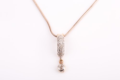Lot 6 - A diamond-set pendant, the curved pave-set...