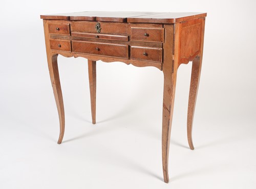 Lot 101 - A Louis XVI style parquet line inlaid mahogany...