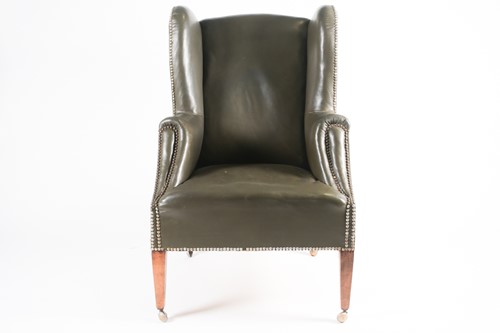 Lot 102 - A late 19th century green leather upholstered...