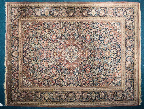 Lot 282 - A 20th century Kerman rug with "Bookcover"...