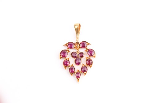 Lot 400 - A ruby set foliate pendant, of leaf shape with...