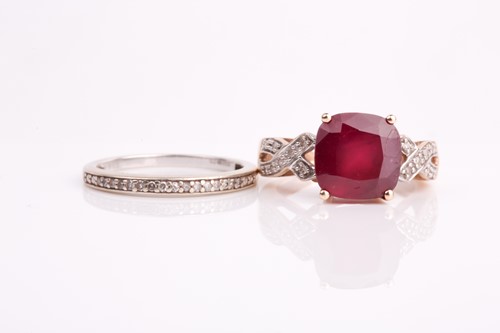 Lot 164 - A single stone ruby ring, the cushion-cut ruby,...