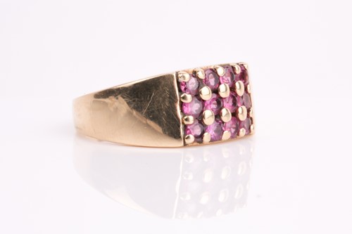 Lot 111 - A rectangular pink tourmaline cluster ring, in...