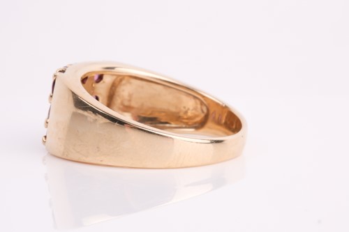 Lot 111 - A rectangular pink tourmaline cluster ring, in...