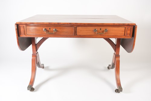 Lot 119 - A George IV figured mahogany sofa table with...