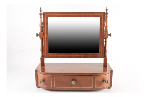 Lot 265 - A George IV break bowfront, crossbanded and...