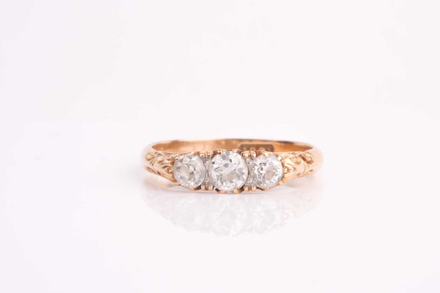 Lot 92 - A late Victorian three stone diamond half hoop...