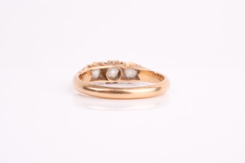Lot 92 - A late Victorian three stone diamond half hoop...