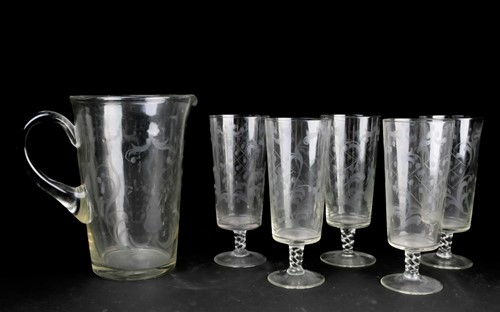Lot 407 - A 20th century etched glass water jug and five...