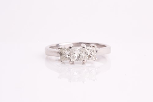 Lot 24 - An 18ct white gold and diamond ring, set with...