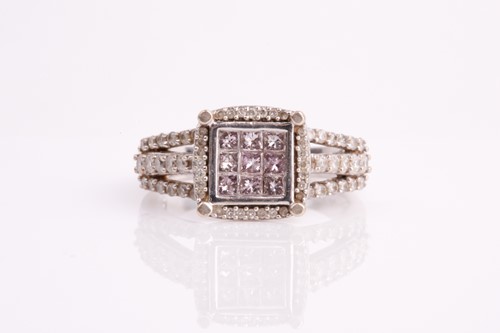 Lot 284 - A diamond and pink diamond 14ct gold cluster...