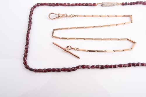 Lot 83 - A 9ct yellow gold watch chain, with...