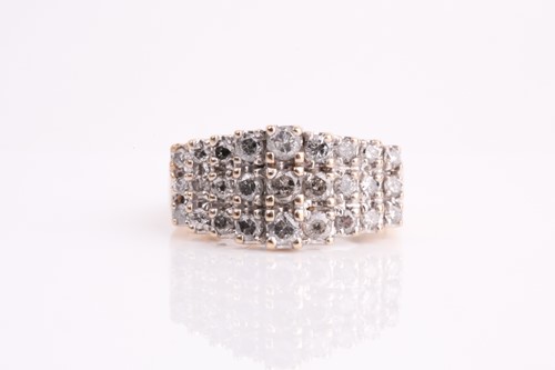 Lot 237 - A yellow metal and diamond ring, the stepped...