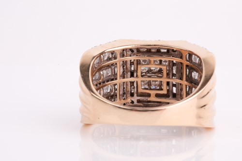 Lot 93 - A yellow metal and diamond ring, calibre-set...
