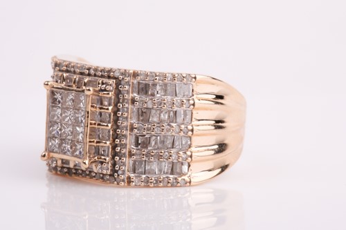Lot 93 - A yellow metal and diamond ring, calibre-set...