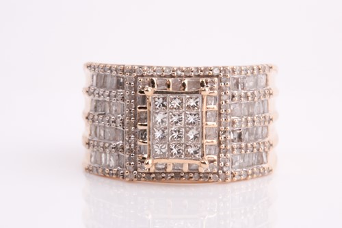 Lot 93 - A yellow metal and diamond ring, calibre-set...