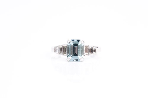 Lot 271 - An aquamarine and diamond ring, the step cut,...