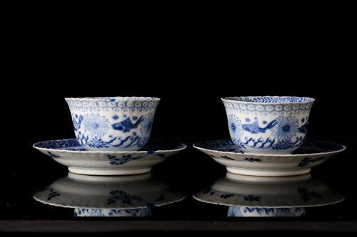 Lot 213 - A pair of Chinese, Kangxi blue and white...