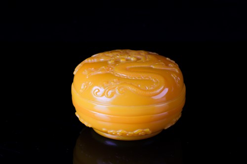 Lot 219 - A Chinese, Peking yellow glass, circular...