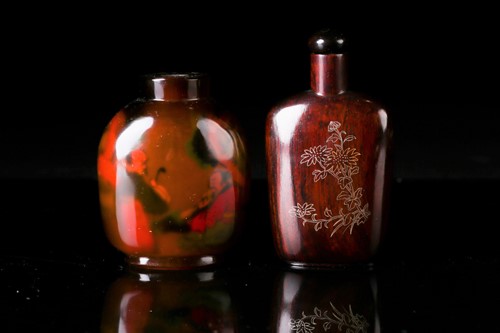 Lot 222 - A Chinese silver inlaid and carved huanghuali...