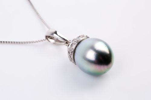 Lot 63 - A single stone Tahitian pearl and diamond...