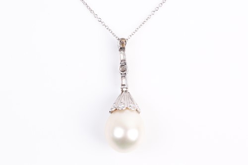 Lot 4 - A South Sea pearl and diamond pendant, the...