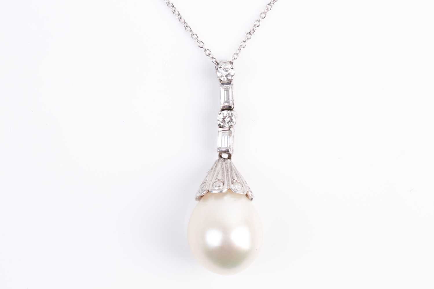 Lot 4 - A South Sea pearl and diamond pendant, the...