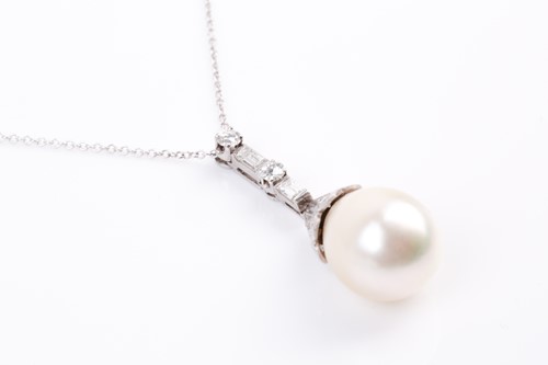 Lot 4 - A South Sea pearl and diamond pendant, the...