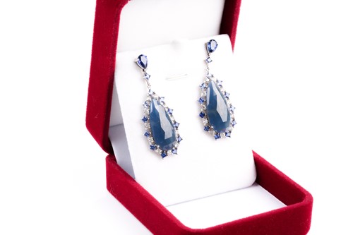 Lot 138 - A pair of sapphire pendant earrings, the...