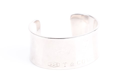 Lot 267 - A Tiffany & Co cuff bangle, the slightly...
