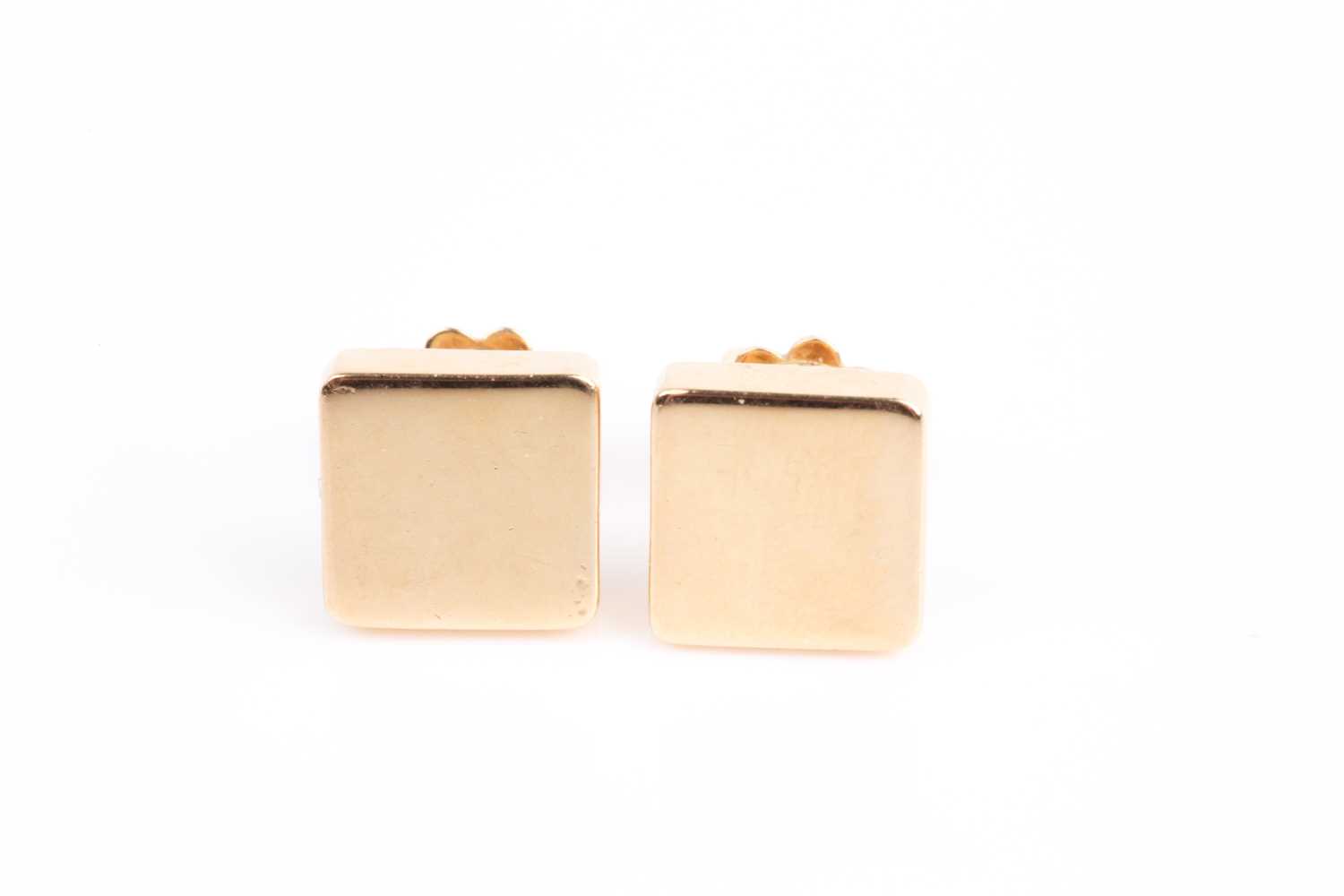 Lot 1 - Tiffany & Co. A pair of 18ct yellow gold plain...