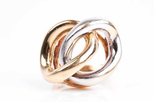 Lot 85 - A white and yellow metal ring, of stylised...