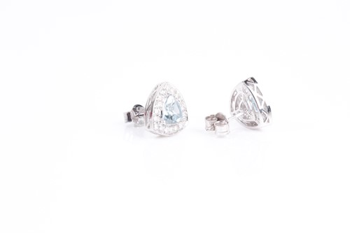 Lot 66 - A pair of 18ct white gold, diamond, and...