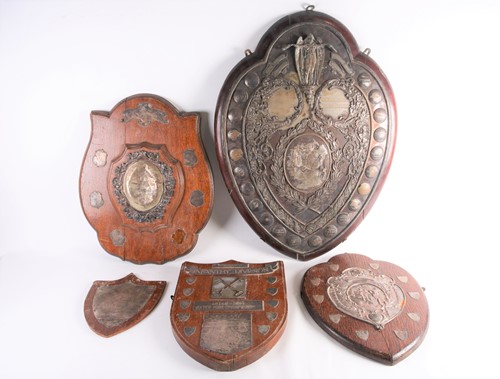Lot 557 - Of military interest, a group of five wooden...
