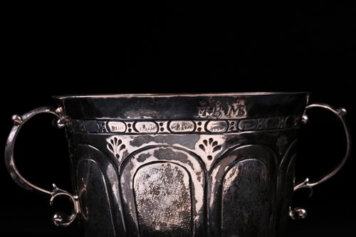 Lot 329 - A Charles II silver footed porringer, London...