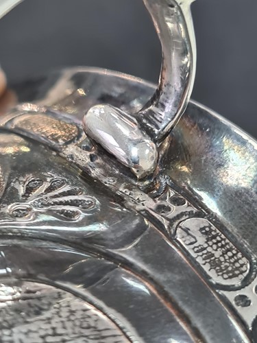 Lot 329 - A Charles II silver footed porringer, London...