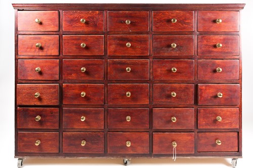 Lot 253 - An early 20th century flight of thirty oak...