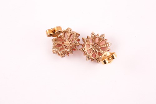Lot 89 - An orange and white sapphire cluster ring, the...