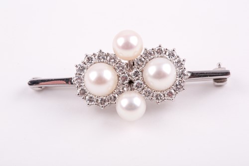 Lot 130 - A diamond and pearl quatrefoil cluster bar...