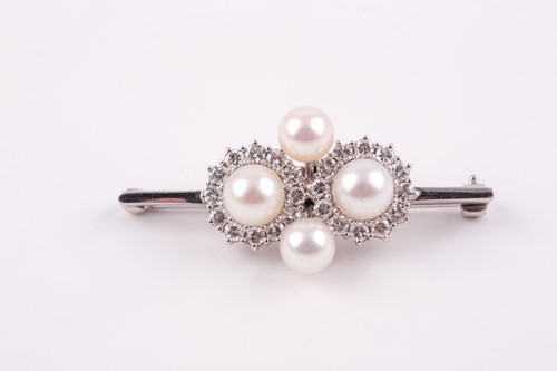 Lot 130 - A diamond and pearl quatrefoil cluster bar...