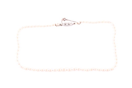 Lot 277 - A cultured pearl necklace, the graduated...