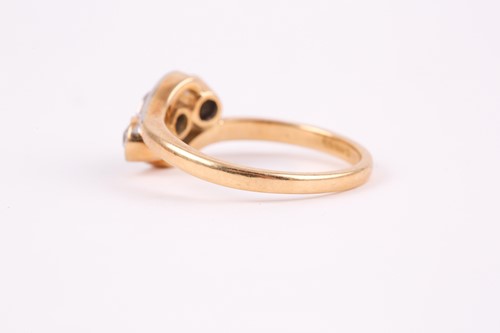 Lot 64 - An 18ct yellow gold and diamond crossover ring,...