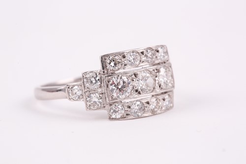 Lot 71 - A platinum and diamond ring, set with three...