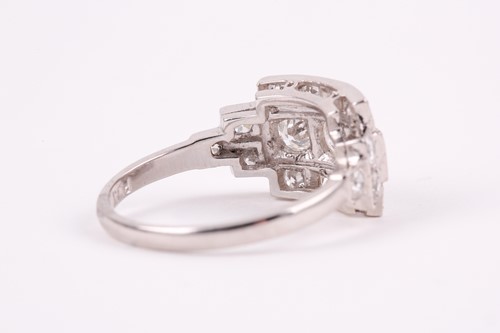 Lot 71 - A platinum and diamond ring, set with three...