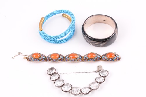 Lot 247 - A turquoise-coloured beaded bangle with gilt...