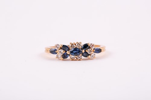 Lot 174 - An 18ct yellow gold, diamond, and sapphire...