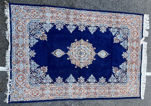 Lot 316 - A Kashan carpet with central lozenge and...